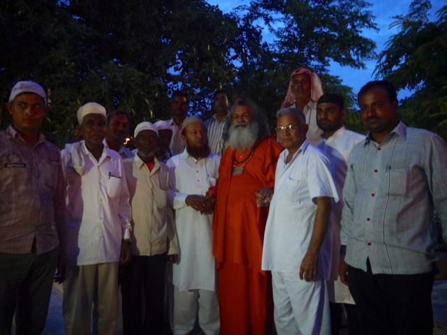 Hindus and Muslims meet in Bari Khatu Ashram at the end of Ramadan